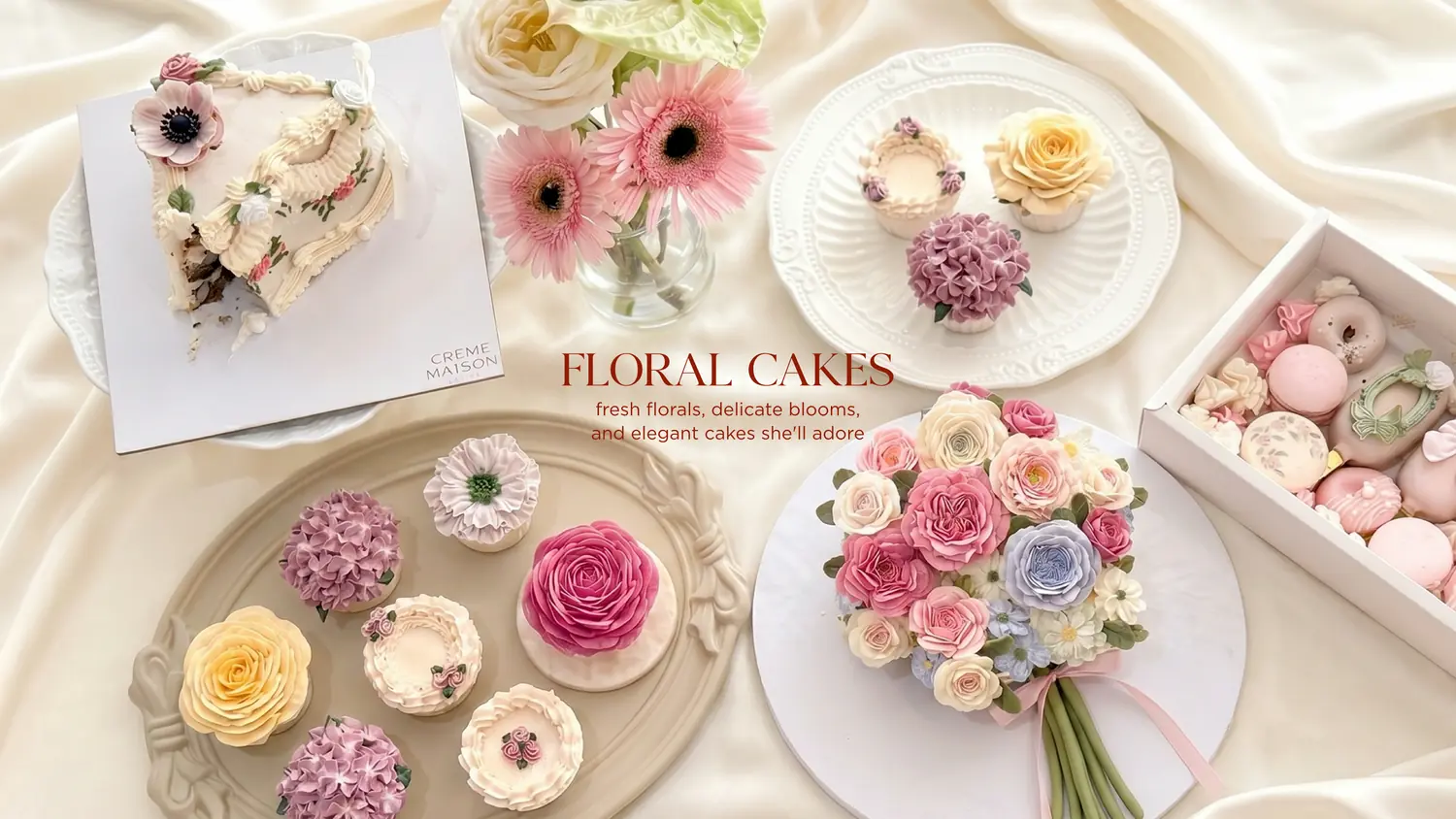 Pastel flower-topped cakes, macarons, and a bouquet arranged on satin for a floral cake advertisement.